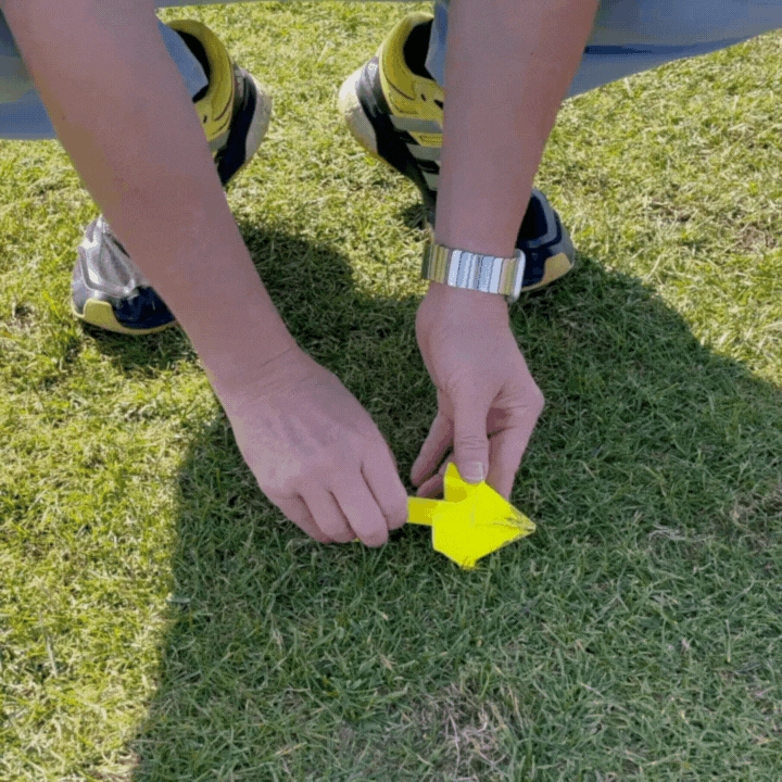 After placing the spot in the ground, use the spike of the Ulteemate to aim where you want your drive to go. This helps guide your drive to where you want it to go.
